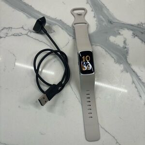 Fitbit Charge 6 with accessories